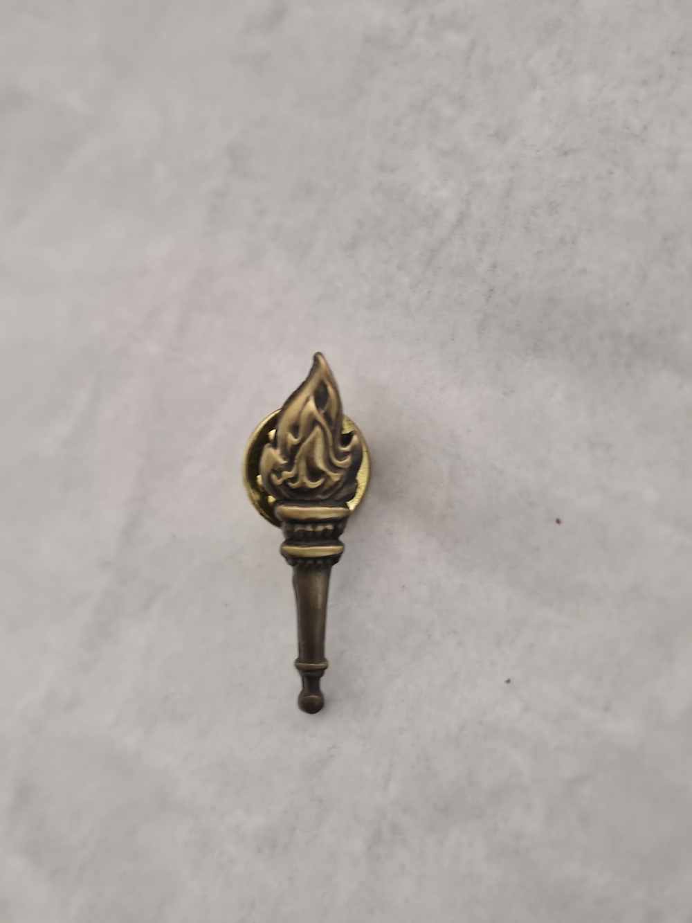 Antique-Inspired Torch Brooch in Gold Tone